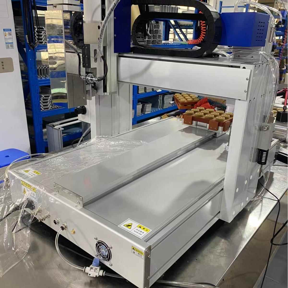 厂家直销00CC树脂全自动点胶安装磁石设备