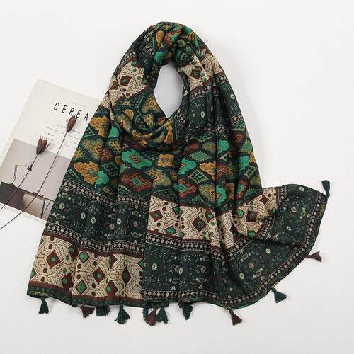 woman with a retro color-blocked small floral long shawl围巾