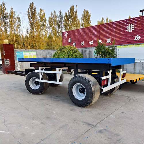 厂区转运搬运路上运输宽体轮胎载重15吨平板运输拖车