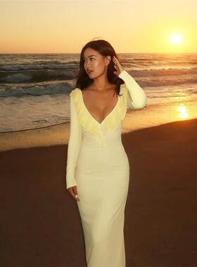 Ruffle long sleeved elastic dress with hip wrap