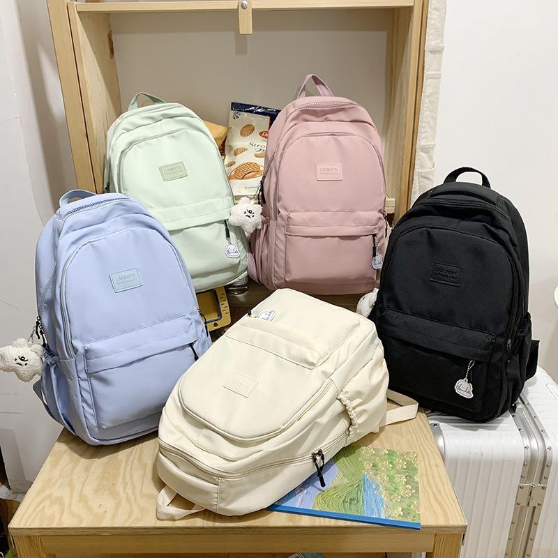 萌系双肩包大学生通勤女初中女生新款大容量小学生中学生高中生背包学生双肩包图片