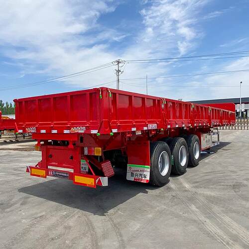 山东鲁兴挂车厂 砂石料运输半挂车 平板轻型一体侧翻自卸半挂车