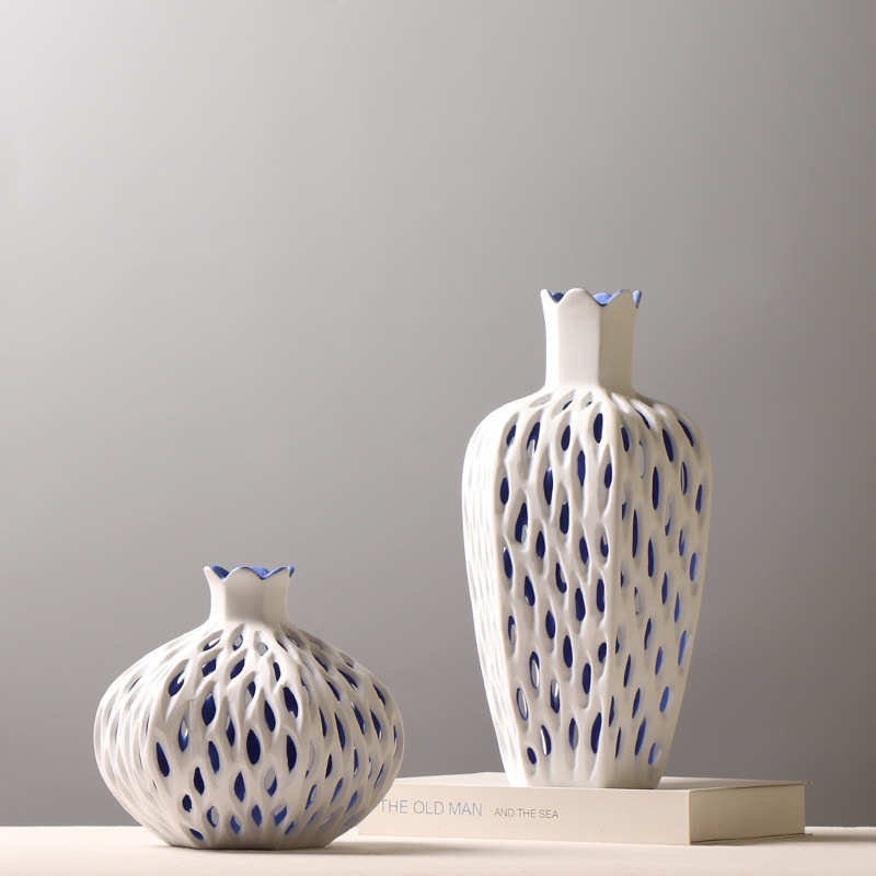 简约现代创意镂空杨桃花瓶样板房酒店轻奢插花装饰品摆件台面陶瓷