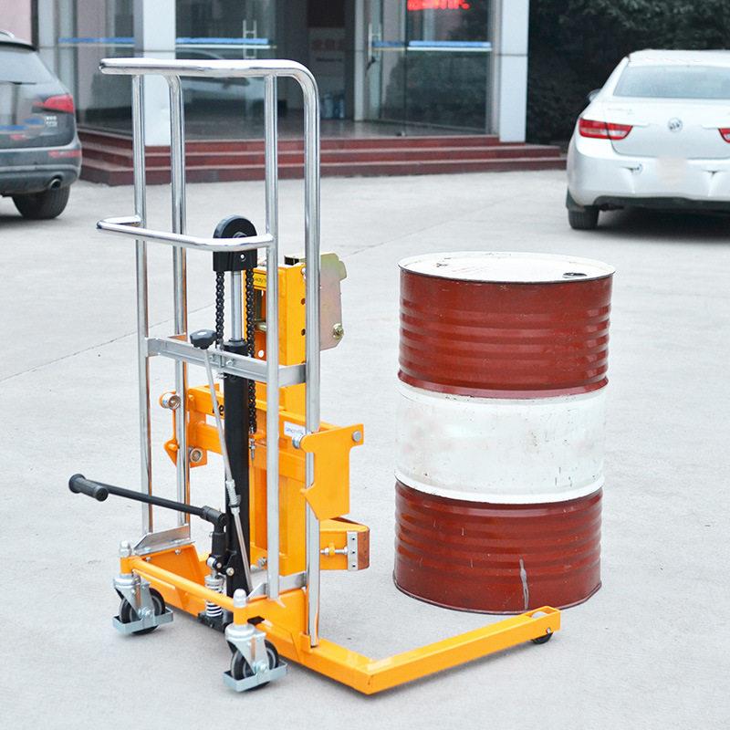 供应轻型手动油桶装卸搬运升降叉车倒料堆手推圆桶运输脚踏叉车