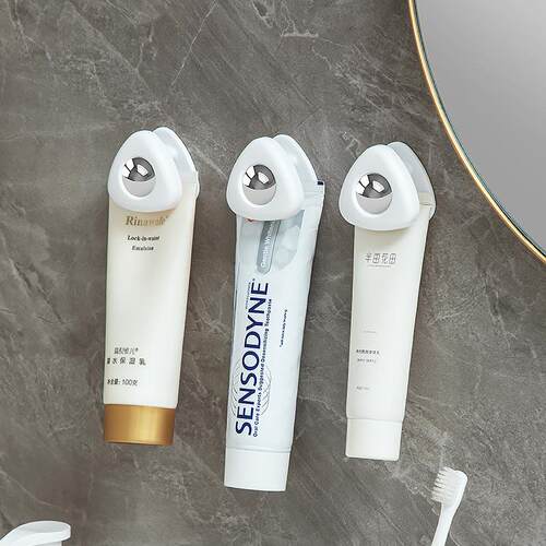 Wall-mounted towel and toothpaste holder for the bathroom, n