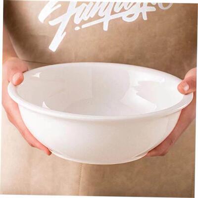 Plain white ceramic salad bowl deep soup plate chopped peppe