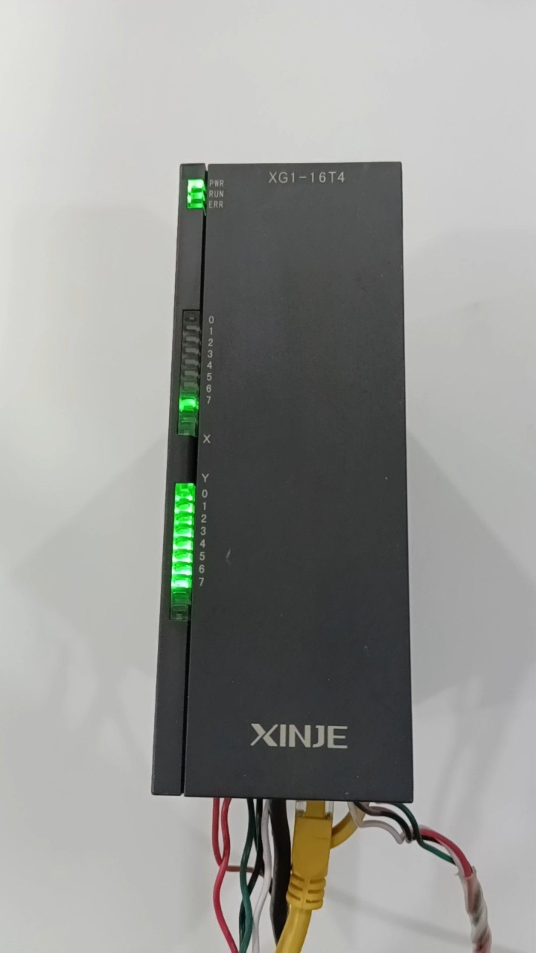 信捷XG1-16T4，1只，新机成色，实物图。4轴脉冲输出，