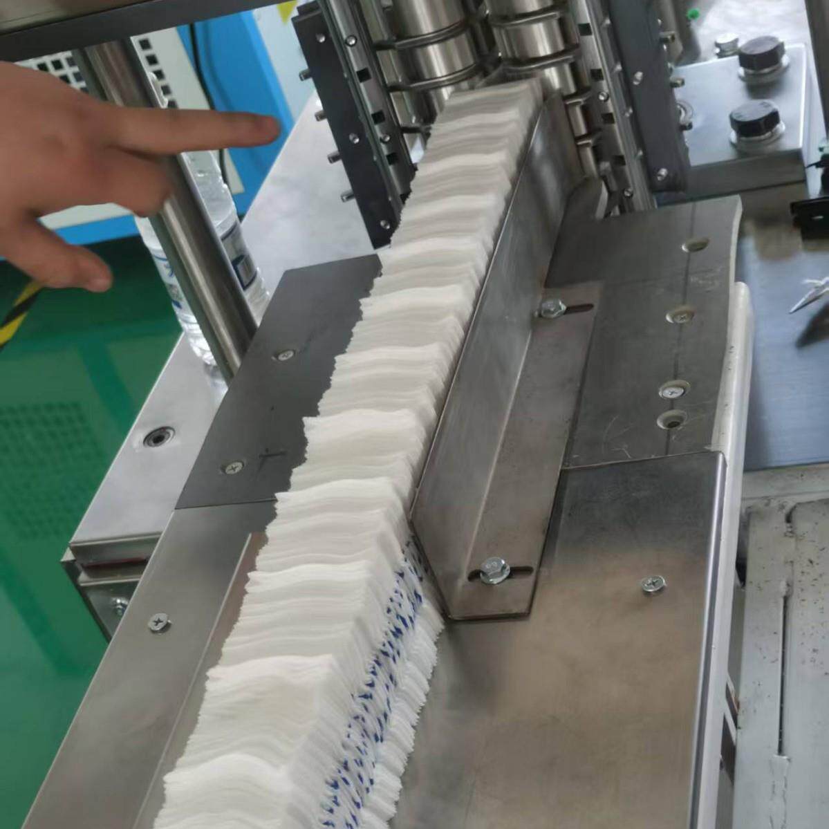 供应一次性无纺布高领土止血纱布折叠机X光显影线折叠机厂家生产