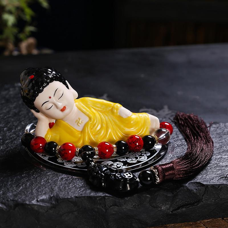 佛像陶瓷汽车摆件个性创意车载如来卧佛保平安车内高档装饰品