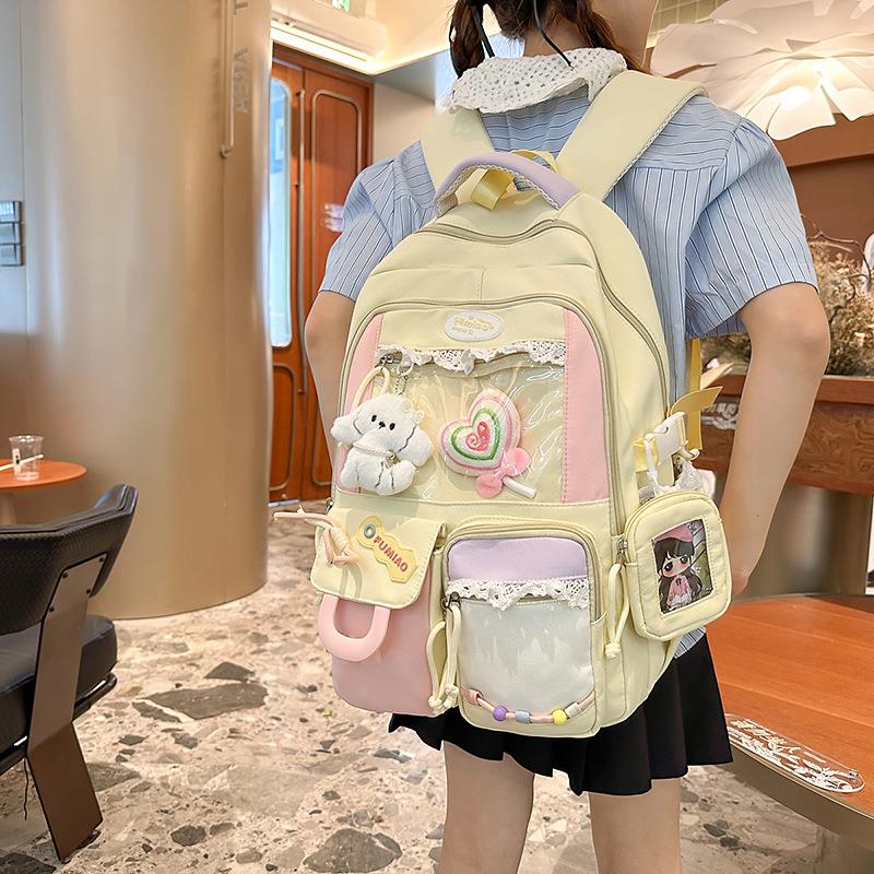 日系吧唧痛包ins风大容量学生双肩包女可爱拼色书包初中生背包潮图片