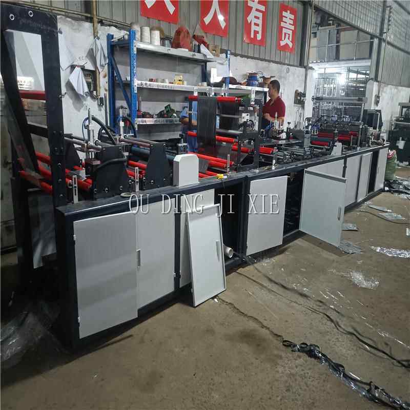 供应黑色多孔相片袋制袋机OPP展示册生产机械游戏卡内页袋机台