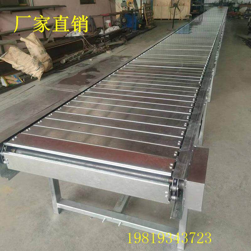 弯板输送机重型炼板输送机纸壳打包机吨包装大型输送带制造商