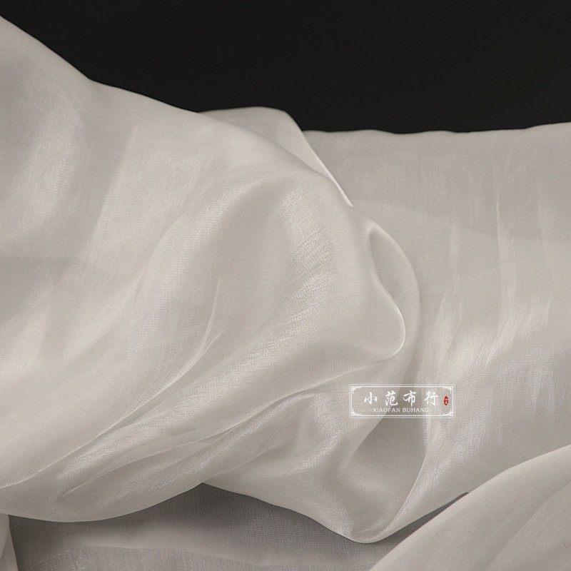 一米价 本白色水波亮面软欧根纱布料 波光粼粼汉服门帘娃衣面料