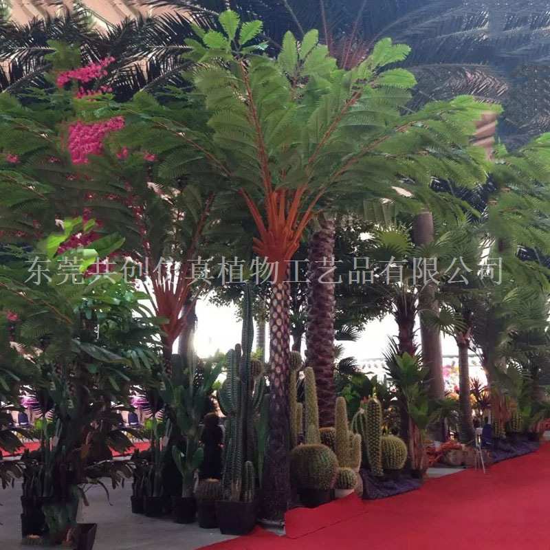 厂家供应 过胶手感布桫椤叶人造仿真绿植沙罗树枝 摄影道具假树叶