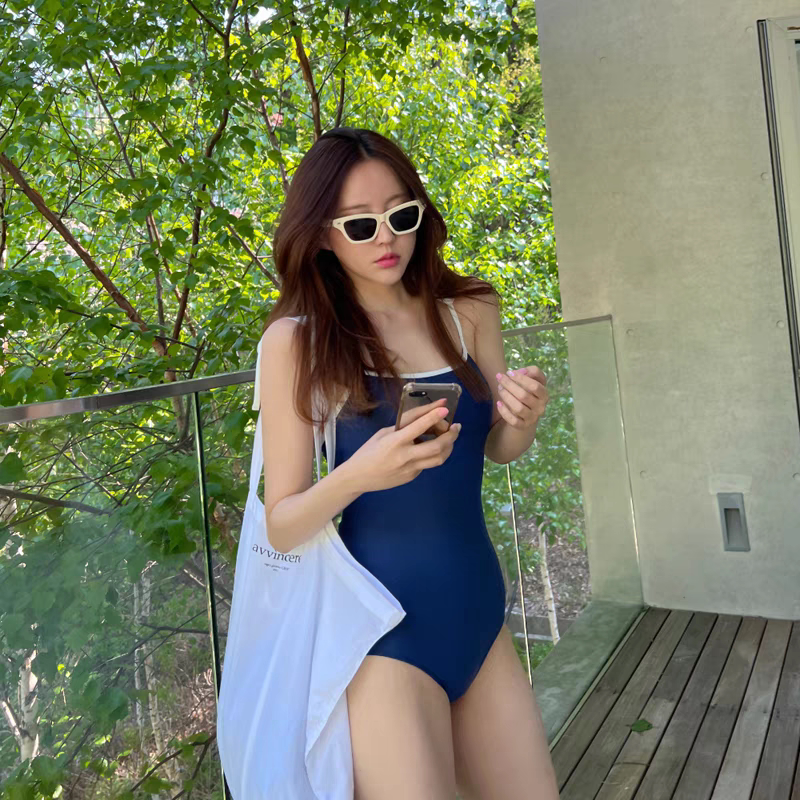 泳衣女新款简约气质款纯色三角连体比基尼小胸性感可爱遮肚泡温泉