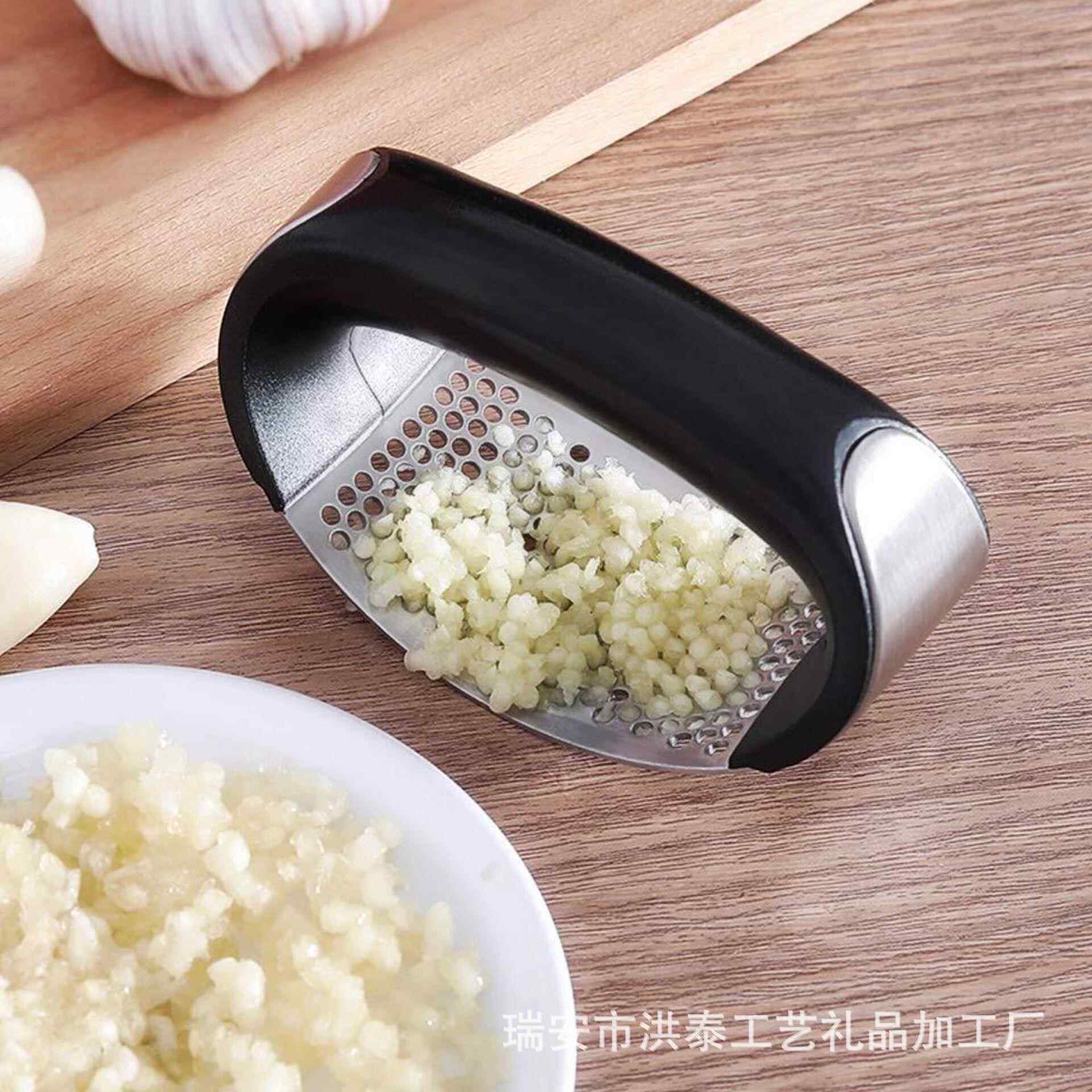 不锈钢压蒜器 工厂手动捣蒜器 蒜泥器剥蒜器 大蒜捣碎器 挤蒜器