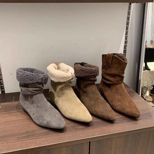 潮牌欧洲站雪地靴女冬新款真皮羊毛保暖两穿时装靴皮带扣英伦短靴