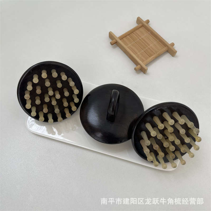 厂家批发牛角梳牛角28钉黑檀环指梳头部经络按摩梳手柄梳刮痧板
