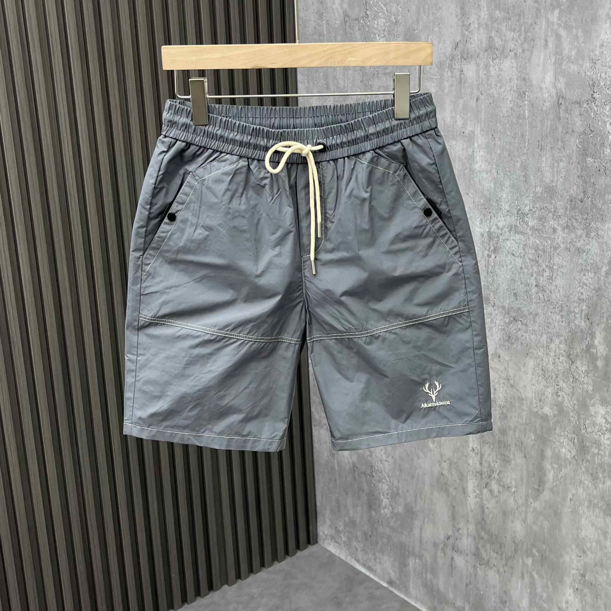 代购夏季新款短裤男速干韩版沙滩裤修身休闲中裤工装五分大裤衩了