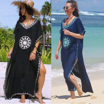Black V-neck white embroidered circle on the chest loose