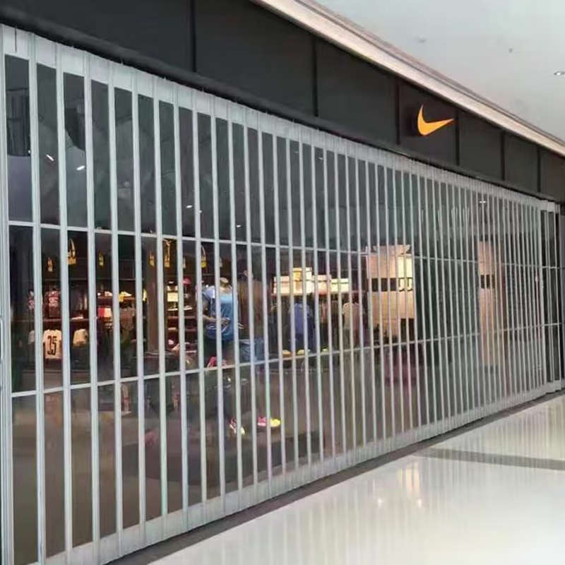 商场水晶折叠门pvc铝合金弧形防盗无下轨道侧拉推拉商铺透明卷帘