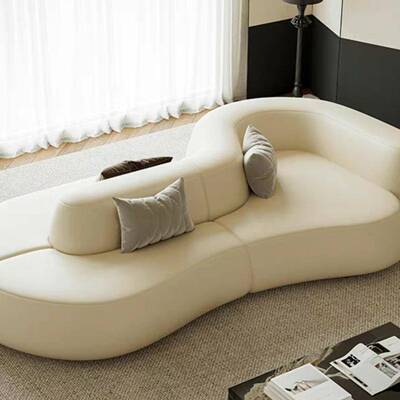 现代简约皮艺沙发双面坐法式奶油风客厅高端设计款异形诧寂风沙发