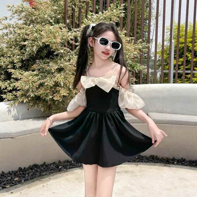 英国NextKiss女童泳衣夏季2025新款儿童吊带泳装大童蝴蝶结沙滩裙