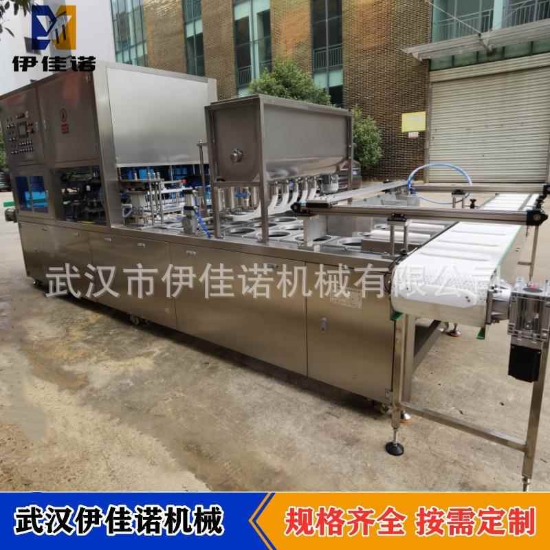 全自动铝箔碗装酸菜鱼羊蝎子酸汤肥牛冻品预制菜连续式包装封口机图片