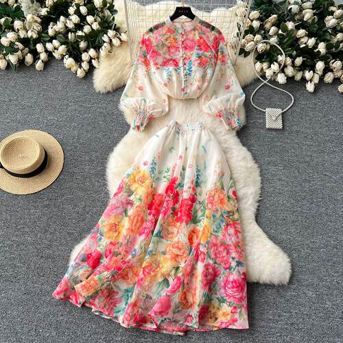 Two lantern sleeve top, high waisted printed mesh skirt,