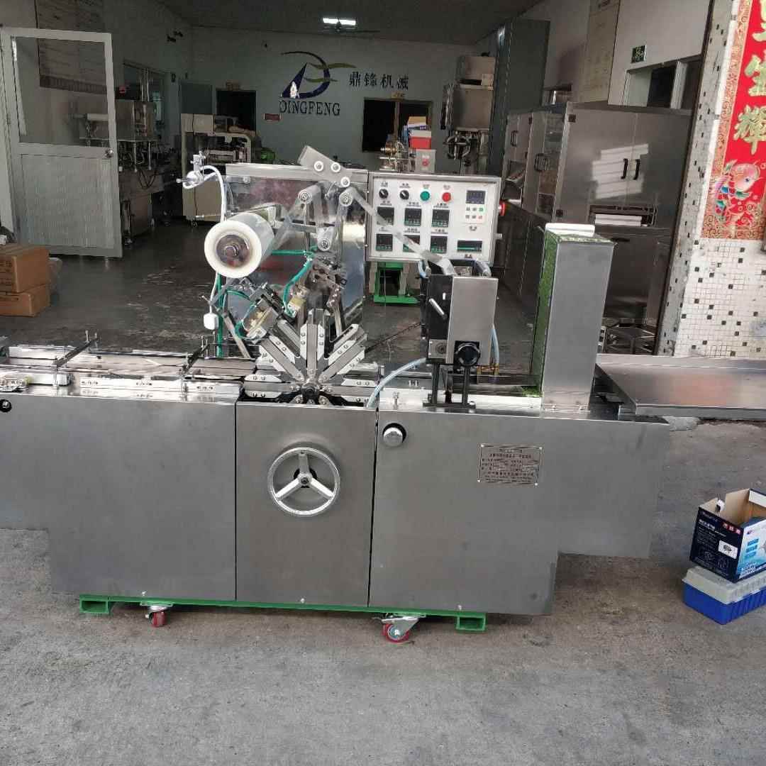 广州鼎锋厂家香烟盒包装机透明膜包装机适合各种大小盒子欢迎来