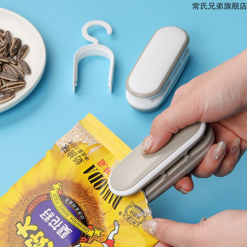 日式迷你便携封口机小型家用塑料袋封口器零食手压式电热密封器