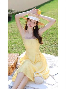 2025夏季法式性感黄色吊带连衣裙夏季新款吊带裙收腰长裙度假裙子