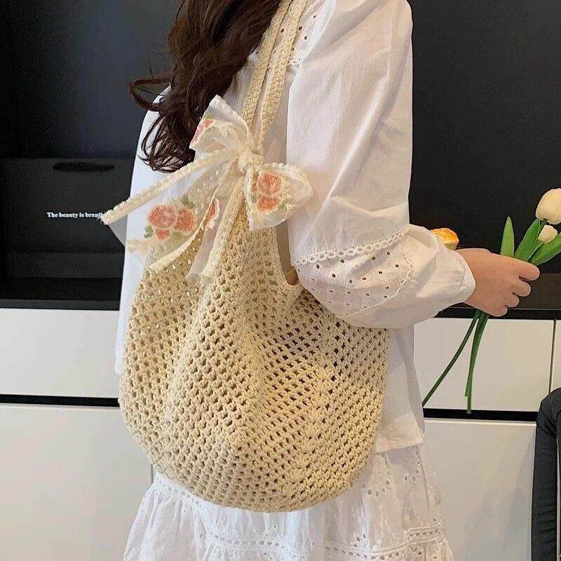 大容量包包女2026新款百搭单肩海边度假沙滩包编织草编通勤托特包