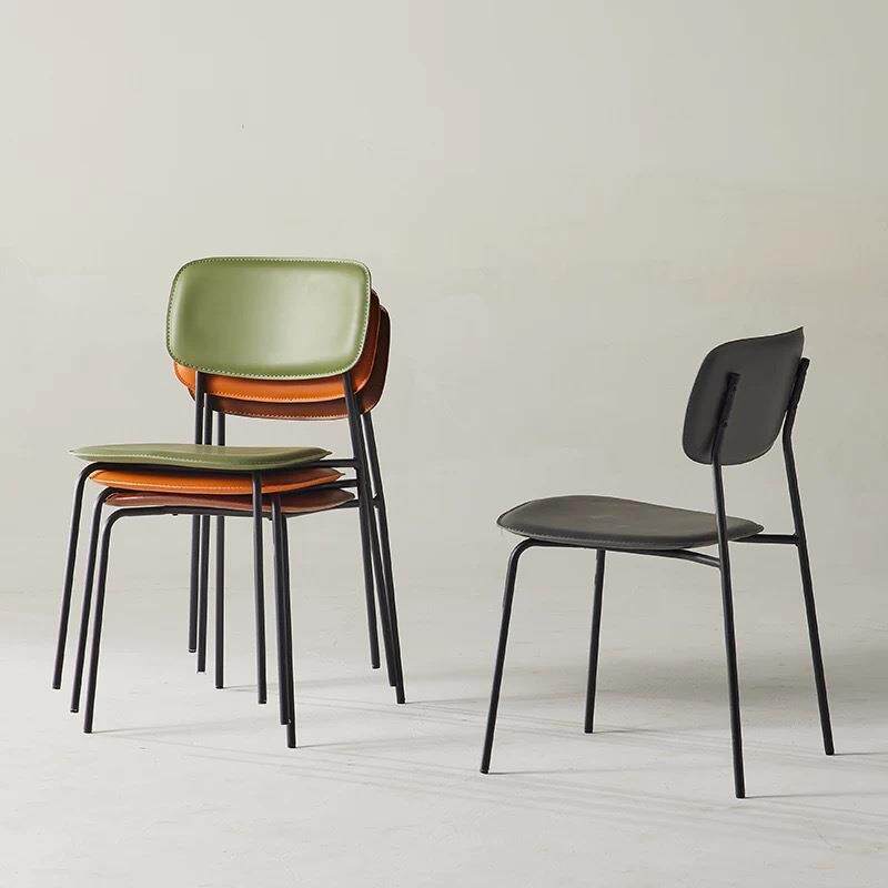 网红马鞍皮餐椅家用简约靠背单人椅咖啡厅叠放皮艺轻奢休闲椅子