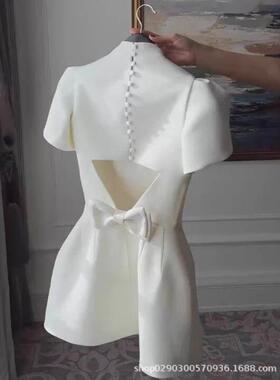 Half high neck short sleeved cinched ivory white dress