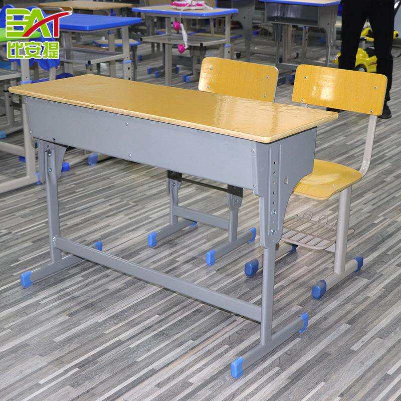 供应中小学钢木学生双人课桌椅加固可升降培训班学习桌