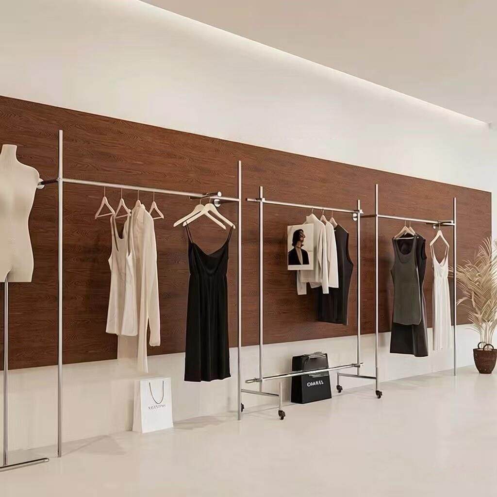 服装店挂衣架简约不锈钢上墙展示架女装店中古风墙上侧挂陈列货架