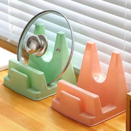 A kitchen countertop organizer that includes a water tray, n