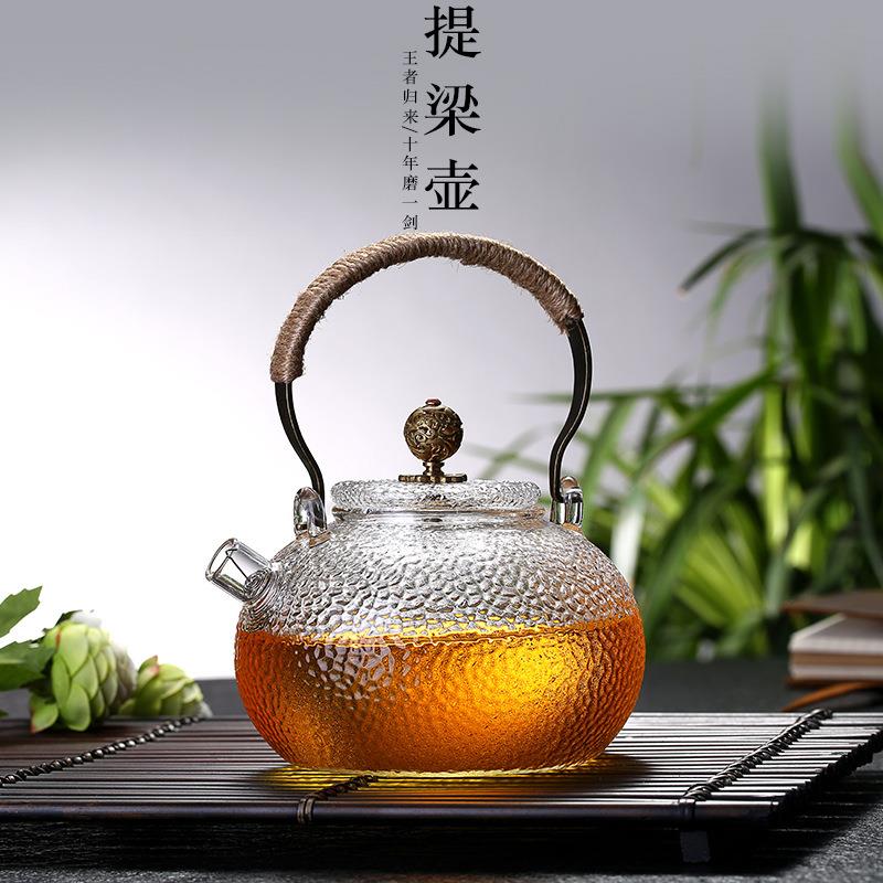高硼硅玻璃泡茶壶加厚耐高温锤纹玻璃壶铜把提梁壶滤嘴花茶壶