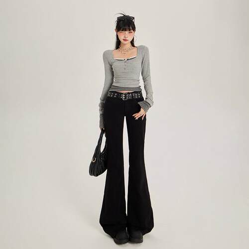 Black low waisted slightly flared jeans for women, not