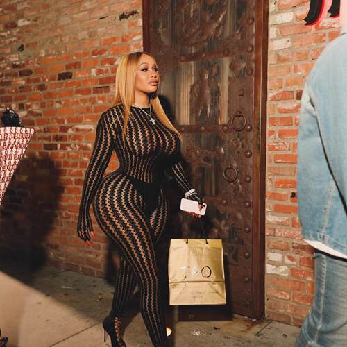 Tight fitting jumpsuit with tight fitting stockings