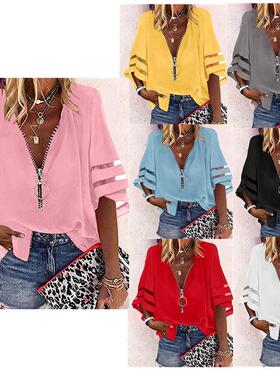 A women's solid color mesh spliced loose casual V-neck