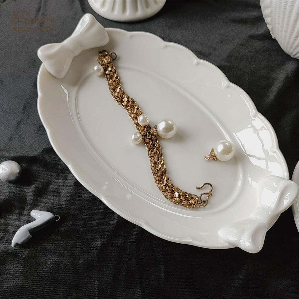 出口欧洲白色点心盘 浮雕蝴蝶结椭圆小盘子 甜品碟素雅首饰收纳盘