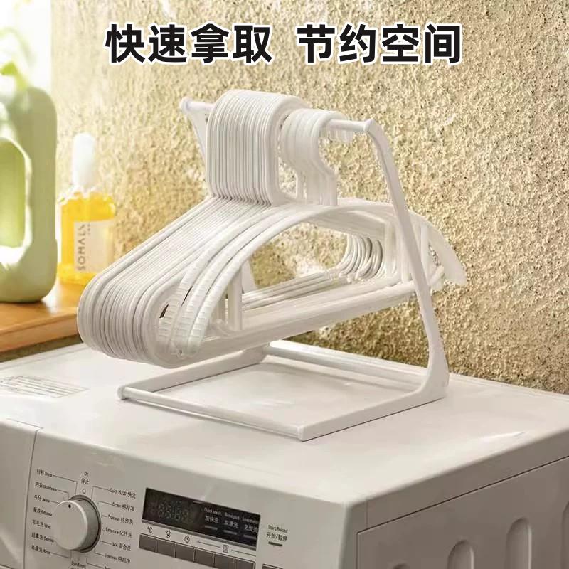 衣架收纳神器生活阳台放挂衣架置物架存放整理盒凉晾衣架放置架子图片