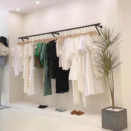 新款服装店上墙展示架黑色烤漆铁艺婚纱童装女装店货架陈列挂衣杆