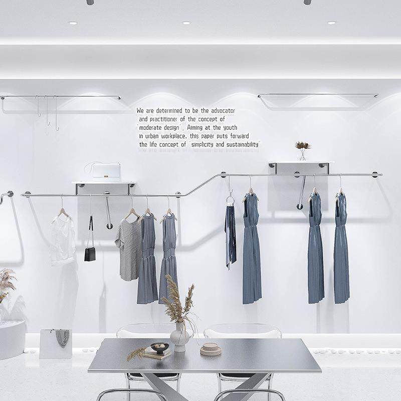 服装店装修设计效果图网红女装店布置展示架不锈钢上墙式挂衣货架,纺织面料/辅料/配套,纺织机械配件,淘宝优惠券,粉丝福利购,淘宝优惠卷