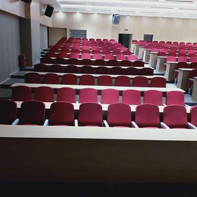 定厂家写字板礼堂椅大简约翻转胶壳软包座垫自动回位大学礼堂排椅