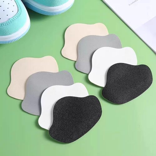 Self-adhesive shoe repair patches for worn-out or torn areas