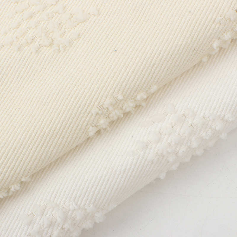 牛仔布全棉帆布斜纹染色爱心钩花洗水面料批发