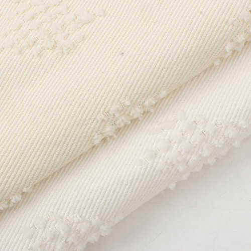 牛仔布全棉帆布斜纹染色爱心钩花洗水面料批发